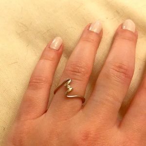 Silver ring with tiny diamond